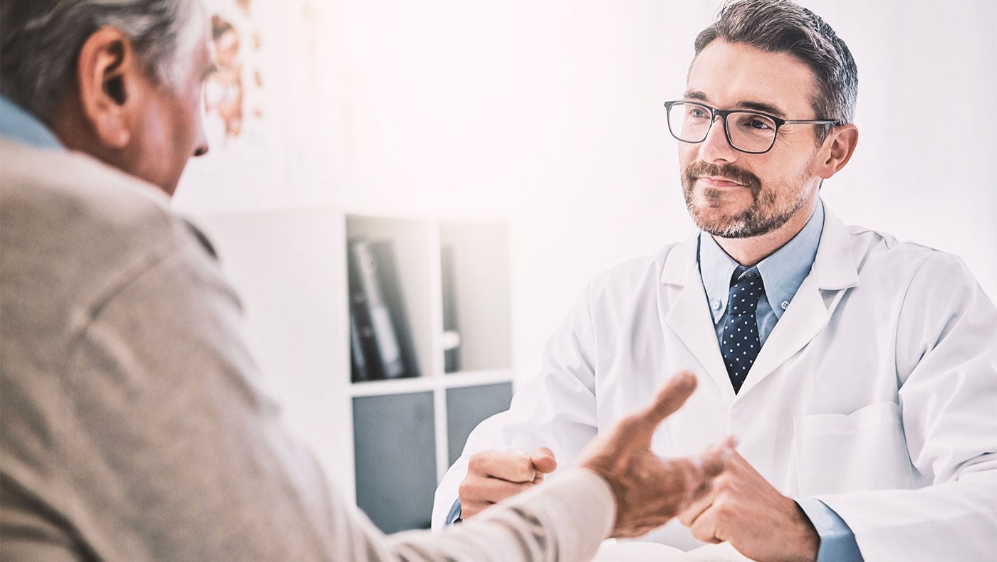 A physician explains unrinary incontinance to her elderly patients