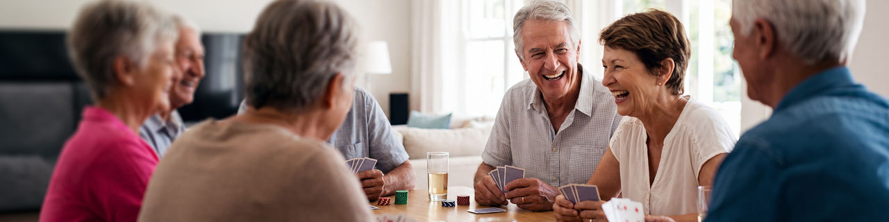 men and women playing laughing