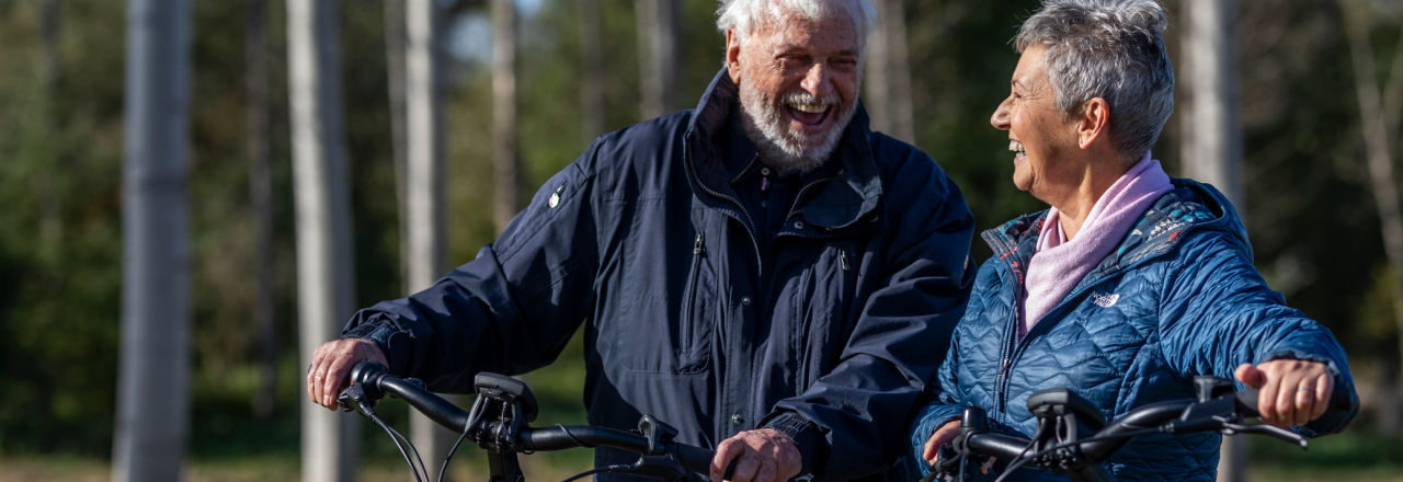 A smiling older couple